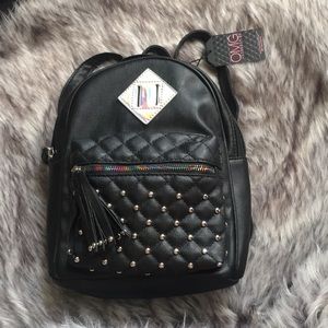 Mini backpack with tag